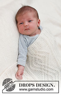 Whisper of White / DROPS Baby & Children 39-2 - Knitted blanket for baby in DROPS Alpaca and DROPS Kid-Silk. The piece is worked with cables. Theme: Baby blanket