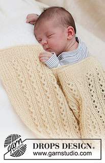 Honey Honey / DROPS Baby & Children 39-4 - Knitted blanket for baby in DROPS BabyMerino and DROPS Kid-Silk. The piece is worked with lace pattern. Theme: Baby blanket