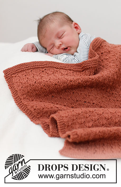 Terracotta Dreams / DROPS Baby & Children 39-6 - Gebreide deken voor baby in DROPS Merino Extra Fine. Het werk wordt heen en weer gebreid, met structuurpatroon en ribbelsteek. Thema: babydeken