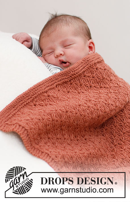 Terracotta Dreams / DROPS Baby & Children 39-6 - Knitted blanket for baby in DROPS Merino Extra Fine. The piece is worked back and forth, with textured pattern and garter stitch. Theme: Baby blanket