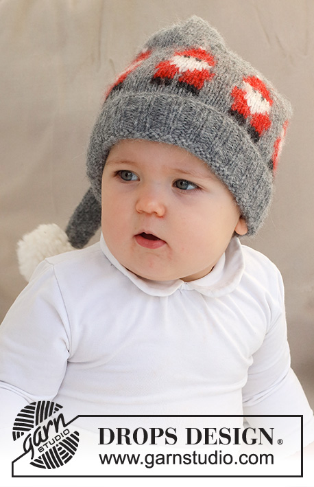 Merry Santas Hat / DROPS Baby 42-22 - Gorro tricotado para bebé, com jacquard de Pais Natal e pompom, em DROPS Air. Tamanhos: 0 - 2 anos. Tema: Natal.