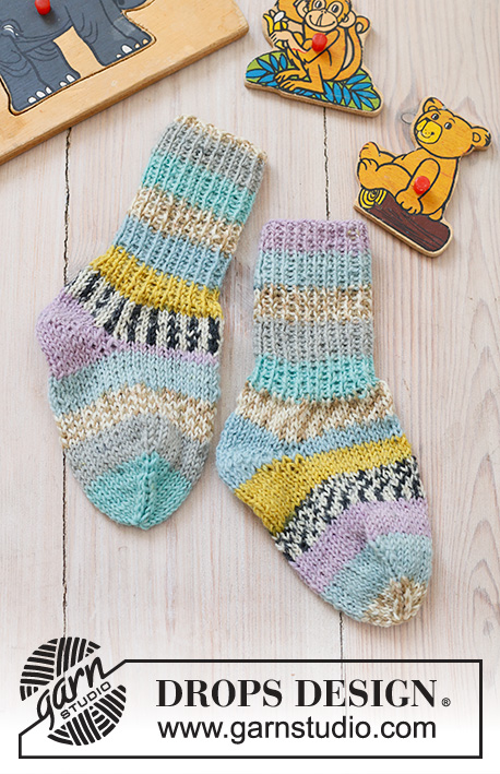 Unicorn Party Socks / DROPS Baby 43-26 - Meias tricotadas para bebé e criança em DROPS Fabel. Tamanhos: 0 - 4 anos.