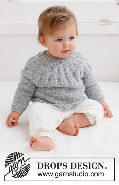 Sweet Gleam / DROPS Baby 43-5 - Knitted jumper for baby in DROPS Sky. The piece is worked top down, with round yoke and ribbing on the yoke. Sizes: Premature to 2 years.