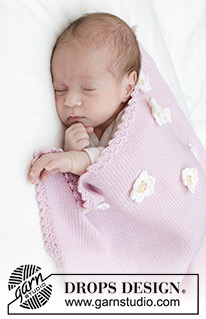 Little Daisy Blanket / DROPS Baby 46-1 - Manta tricotada para bebé em DROPS BabyMerino. Tricota-se em ponto meia com orla em croché e flores. Tema: Manta para Bebé