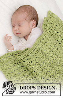 Green Bliss Blanket / DROPS Baby 46-14 - Coperta per bambini lavorata all’uncinetto con motivo traforato in DROPS Cotton Merino.