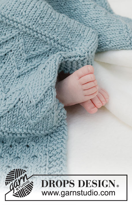 Dot Dot Line Blanket / DROPS Baby 46-3 - Deka pro miminka s plastickým vzorem pletená z příze DROPS Merino Extra Fine.