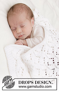 Bright Cuddles Blanket / DROPS Baby 46-4 - Gebreide babydeken in DROPS Big Merino. Het werk wordt gebreid in kantpatroon.