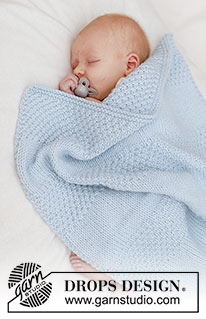 Treasured Pearl Blanket / DROPS Baby 46-5 - Stickad babyfilt i DROPS Big Merino. Arbetet stickas fram och tillbaka med slätstickning och moss-stickning i ränder.
