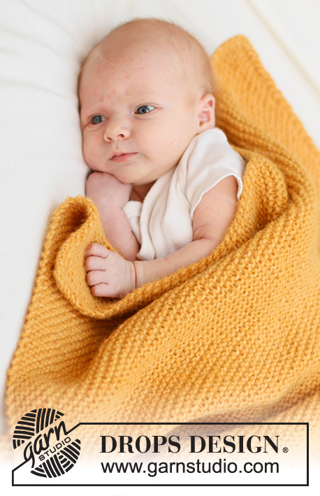 Marigold Dreams Blanket / DROPS Baby 46-6 - Manta a punto para bebé en DROPS Air. La labor está realizada en punto musgo, de esquina a esquina. Tema: Manta para bebé