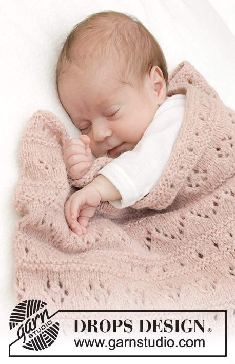 Pink Sea Blanket / DROPS Baby 46-9 - Knitted blanket for baby in DROPS Sky. Piece is knitted with lace pattern and garter stitch.