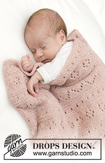 Pink Sea Blanket / DROPS Baby 46-9 - Strikket teppe til baby i DROPS Sky. Arbeidet strikkes med hullmønster og riller.