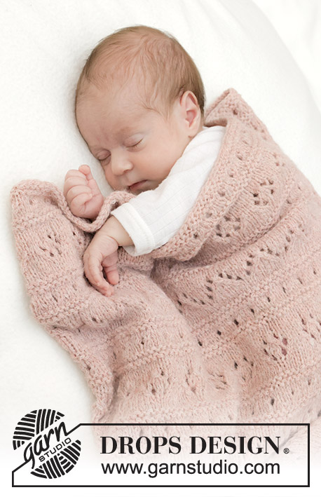 Pink Sea Blanket / DROPS Baby 46-9 - Manta tricotada para bebé em DROPS Sky. Tricota-se com ponto rendado e ponto jarreteira.