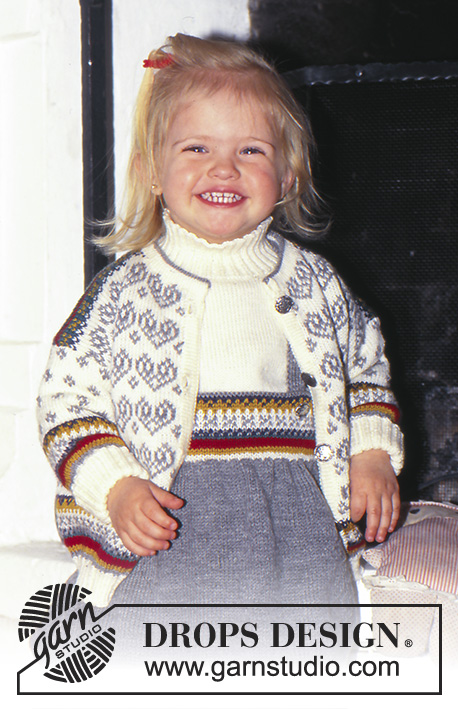 Alpine Joy / DROPS Baby 5-6 - Cardigan, pull, jupe, et chaussettes DROPS en Alpaca avec jacquard Norvégien