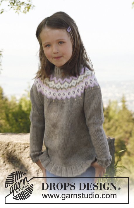 Silje jumper / DROPS Children 23-16 - Stickad tröja med runt ok med mönster och volangkant i DROPS Merino Extra Fine till barn stl 3 till 12 år.