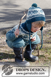 Wild Blueberries / DROPS Children 27-1 - Sæt med jumpsuit strikket oppefra og ned med nordisk mønster og rundt bærestykke og hue med øreklapper og pompon i DROPS Karisma til børn str 1 - 6 år.