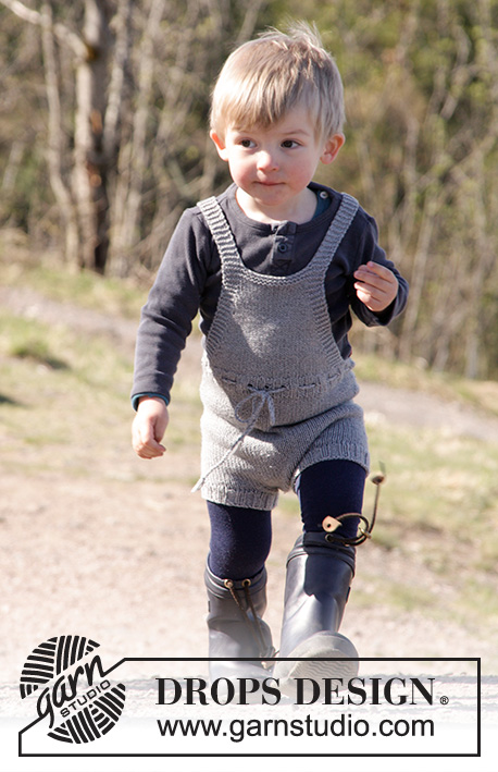 The Little Lumberjack / DROPS Children 27-11 - Dětské krátké kalhoty – kraťasy s laclem a kšandami pletené z příze DROPS Cotton Merino. Velikost: 1 - 24 měsíců.