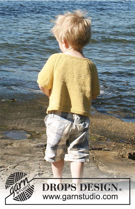Lucky Ducky / DROPS Children 28-6 - Dětský raglánový pulovr s krátkým rukávem, zapínáním a kapsou pletený shora dolů z příze DROPS Belle. Velikost 0 měsíců - 6 let.