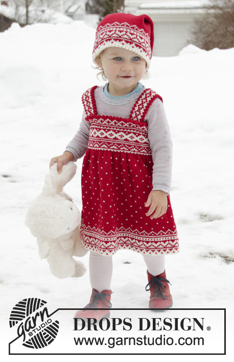Miss Cookie / DROPS Children 32-2 - Knitted dress for babies and children in DROPS BabyMerino. The piece is worked top down with Nordic pattern. Sizes 6 months – 6 years.