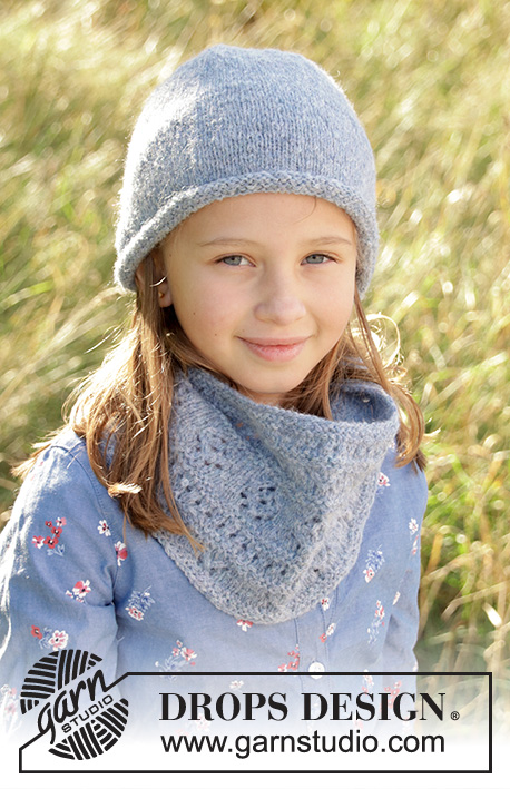 Agnes Set / DROPS Children 34-11 - Knitted neck warmer and hat for kids in DROPS Sky. Neck warmer with lace pattern and hat in stocking stitch with rolling edge. Size 3-12 years
