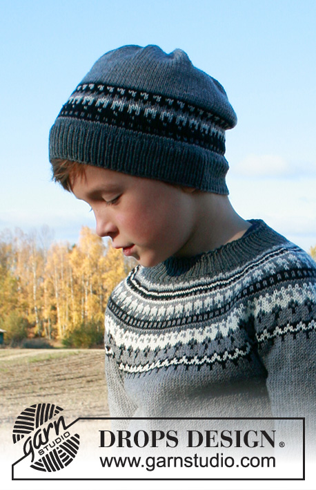 Dalvik Hat / DROPS Children 34-19 - Bonnet enfant tricoté en DROPS BabyMerino, avec jacquard nordique. Du 2 au 12 ans.