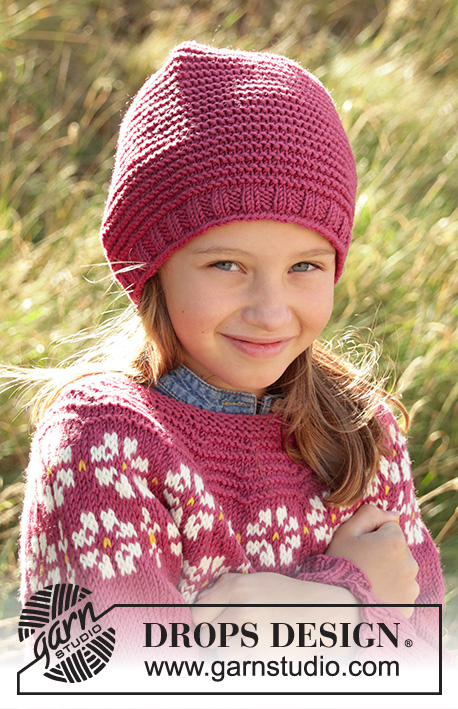 Daisy Delight Hat / DROPS Children 34-6 - Bonnet enfant tricoté en rond, de bas en haut, avec point mousse et jersey, en DROPS Merino Extra Fine ou DROPS Lima. Du 3-12 ans.