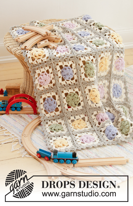 Pastel Dreams / DROPS Children 35-7 - Manta crochetada com quadrados em croché em DROPS Merino Extra Fine. Tema: Manta para Bebé