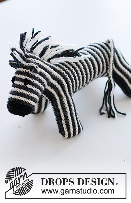Oreo the Zebra / DROPS Children 37-19 - Zèbre tricoté au point mousse rayé, en DROPS Merino Extra Fine.