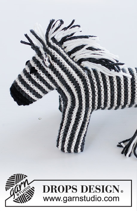 Oreo the Zebra / DROPS Children 37-19 - Zebra na drutach przerabiana ściegiem francuskim w paski, z włóczki DROPS Merino Extra Fine.