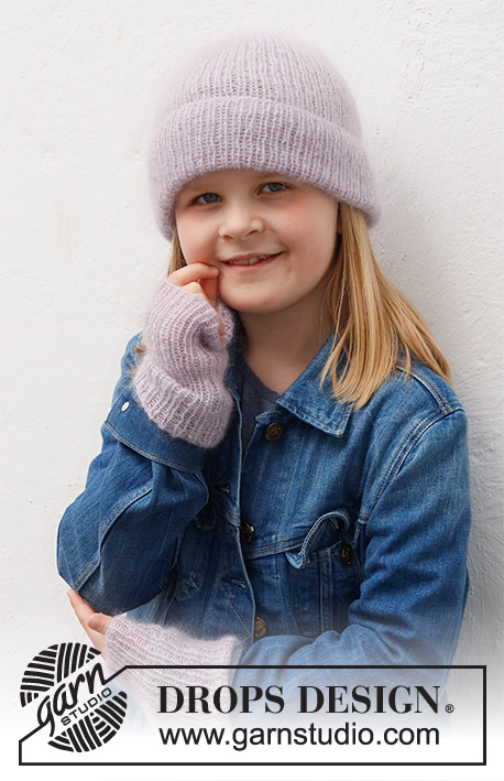 Sweet Attitude / DROPS Children 40-27 - Gorro e punhos tricotados para criança, em canelado, com 2 fios DROPS Kid-Silk.
Tamanhos: 2 - 12 anos.