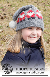 Merry Santas Hat / DROPS Children 41-18 - Stickad mössa till barn i DROPS Air. Arbetet stickas med tomtar och garnboll.
Storlek 3 – 14 år. Tema: Jul.