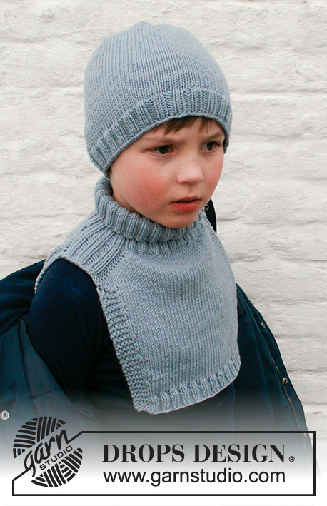 Mister Chill / DROPS Children 41-26 - Knitted hat and neck warmer for kids in DROPS Merino Extra Fine. Piece is knitted in stockinette stitch with edges in rib and increase for saddle shoulder. Size 2 to 12 years