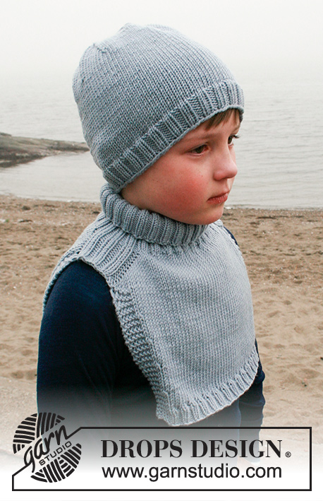 Mister Chill / DROPS Children 41-26 - Knitted hat and neck warmer for kids in DROPS Merino Extra Fine. Piece is knitted in stockinette stitch with edges in rib and increase for saddle shoulder. Size 2 to 12 years