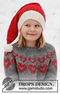 Merry Hearts / DROPS Children 41-3 - Stickad jultröja och tomteluva till barn i DROPS Air. Tröjan stickas uppifrån och ner, med runt ok och hjärtmönster. Mössan stickas i slätstickning med resår. Storlek 2 - 14 år. Tema: Jul.
