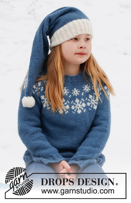 Merry Stars / DROPS Children 41-4 - Lapsen neulotut pusero / joulupusero ja myssy / tonttulakki DROPS Air-langasta. Pusero neulotaan ylhäältä alas ja työssä on kaarroke ja lumihiutalekuvioita. Myssyssä on sileää neuletta ja joustinneuletta. Koot 2-14 vuotta. Teema: Joulu.