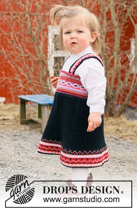 Hipp Hipp Hurra Dress / DROPS Children 44-1 - Stickad klänning / festdräkt till baby och barn i DROPS BabyMerino. Arbetet stickas uppifrån och ner med nordiskt mönster. Storlek 6 månader – 6 år.