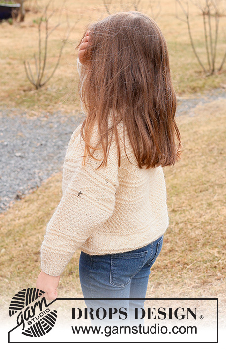 Icing on the Cake / DROPS Children 44-13 - Dětský pulovr pletený zdola nahoru plastickým a perličkovým vzorem z příze DROPS Alaska. Velikost 2 – 12 let.