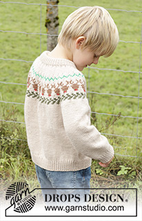 Reindeer Dance Sweater / DROPS Children 47-18 - Kötött pulóver gyerekeknek DROPS Daisy fonalból. A darabot fentről lefelé irányban készítjük, dupla nyakkal, kerek vállrésszel és színes rénszarvas mintával. 2 - 14 éveseknek való méretekben