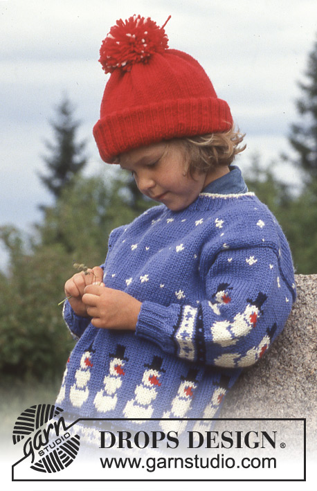 Dancing Snowmen / DROPS Children 5-6 - Stickad jultröja i DROPS Karisma, tröjan stickas med snögubbar. Storlek 3-12 år.
